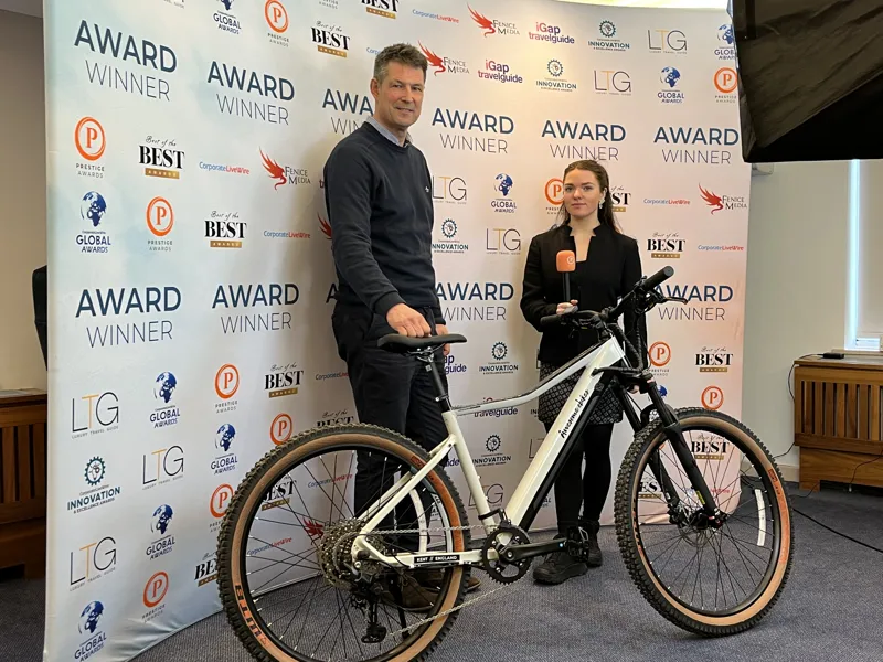 Warren and Marcus winning eBike Retailer of the Year for the South East